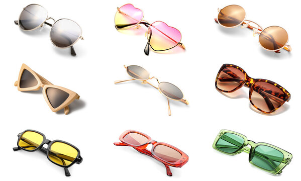 Set of different stylish sunglasses isolated on white