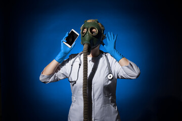 doctor woman in a gas mask talking on the phone on a blue background