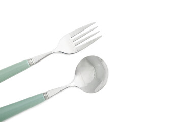 Stainless steel spoon and fork with grey handle on white background, closeup