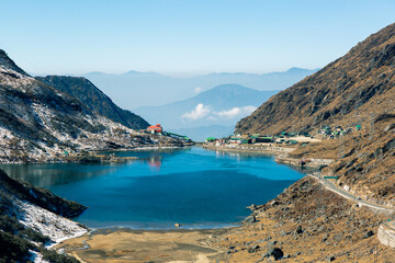 Fototapeta na wymiar Sikkim, India - January 1, 2021: Blue Lake in Sikkim Mountains