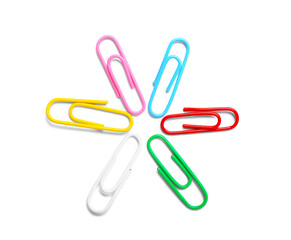 Colorful paper clips on white background, top view