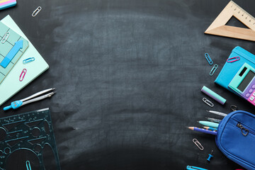 Frame made of stationery supplies on school blackboard © Pixel-Shot
