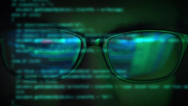 Monitor screen with developing programming and coding technologies. Programmer or hacker is typing code on keyboard. Software engineer working on computer. Developer or big data concept