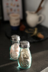 Obraz na płótnie Canvas Salt and pepper shaker on kitchen table