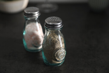 Salt and pepper shaker on kitchen table