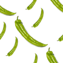Spicy green fresh pepper on a white background. Pattern of green jalapeno peppers