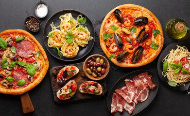 Italian cuisine. Pizza, pasta and toasts