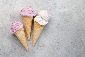 Various ice cream in waffle cones
