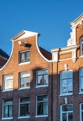 Fototapeta na wymiar Typical merchant house facade in Amsterdam, Netherlands.
