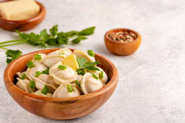 Homemade meat dumplings - russian pelmeni.