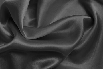 Obraz premium Dark grey fabric texture background, detail of silk or linen pattern.
