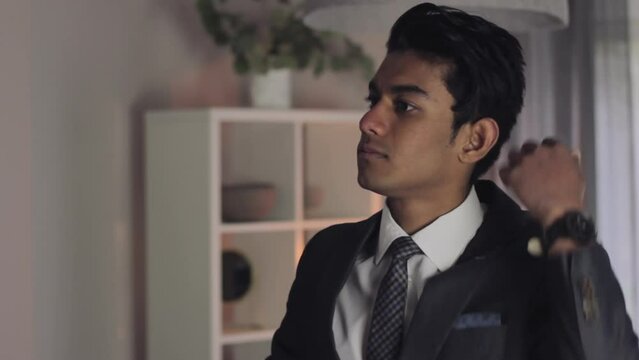 Young Millennial Getting Ready for Date Night, Adjusting Hairstyle