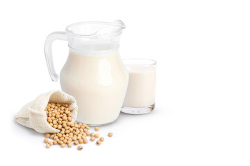 Glass of soy milk with soybeans in sack bag isolated on white background. 