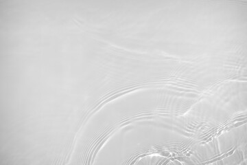 Desaturated transparent clear water surface texture with ripples, splashes Abstract nature...