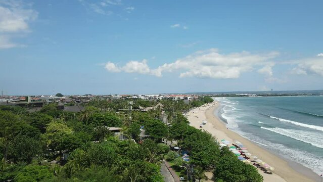 Aerial View of Legian Beach, Bali Island Indonesia, Green Tropical Lush and Blue Ocean Waves