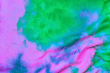 Fototapeta na wymiar Abstract tie dye neon multicolor folded fabric cloth boho pattern texture for background, sale flyer, 60s, 70s, 80s, 90s retro poster, tie-dye diy backdrop. Modern Watercolor wapor wave, Fabrics Art