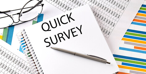 QUICK SURVEY , pen and glasses on the chart, business concept