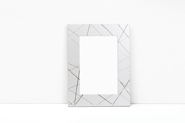 Silvery frame on a white background