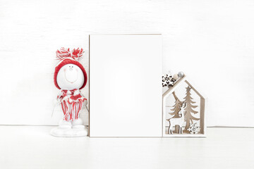 White vertical card with christmas attributes.