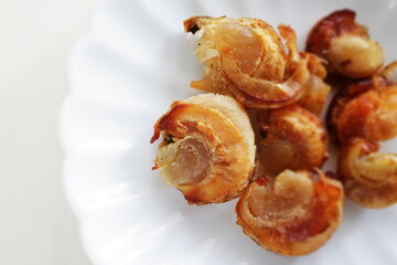 Japanese snack food, dried Hokkaido scallop on white dish