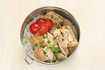 Homemade chicken and fried egg with rice lunch box for asian food image