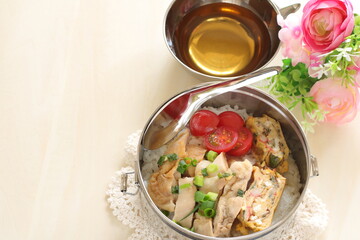 Homemade chicken and fried egg with rice lunch box for asian food image