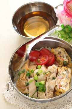 Homemade chicken and fried egg with rice lunch box for asian food image