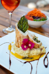 Chicken gordon blue with mashed potatoes and salad