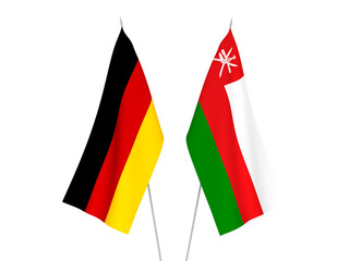 National fabric flags of Germany and Sultanate of Oman isolated on white background. 3d rendering illustration.