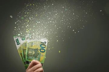 Fotobehang 100 euro bills vanish into thin air © photoschmidt