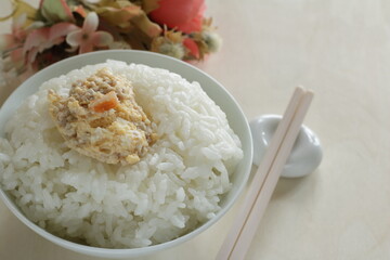 Homemade Chinese comfort. food, mince meat in steamed egg with rice