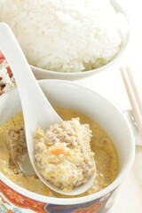 Homemade Chinese comfort. food, mince meat in steamed egg with rice