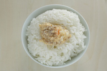Homemade Chinese comfort. food, mince meat in steamed egg with rice