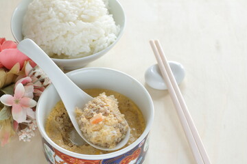 Homemade Chinese comfort. food, mince meat in steamed egg with rice