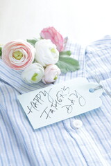 Happy Father's Day hand written card and shirt with artificial flower