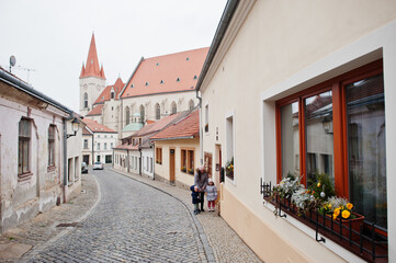 Mother with kids walking old town Znojmo in the South Moravian Region of the Czech Republic.