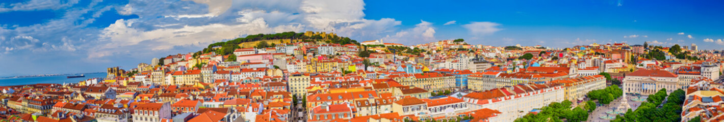 Fototapeta na wymiar Romantic Destinations. Panorama of The Oldest Alfama District in Lisbon in Portugal While Townscape Scenery Made During Daytime.