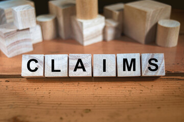 Claims Word In Wooden Cube
