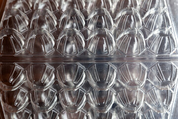close up of transparent plastic packaging. recyclable egg cup