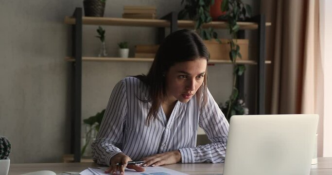 Angry outraged woman office employee do paperwork find mistake in report, feel nervous due deadline throw crumpled paper leaves workplace. Nervous breakdown at work, business problems, bad day concept