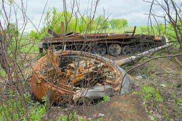 Russian battle tank remains with torn down gun turret