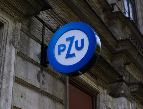 PZU Polish insurance company logo sign. Powszechny Zakład Ubezpieczeń, signboard with logotype on March 21, 2022 in Krakow, Poland.