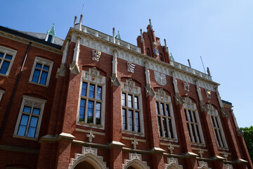 Jagiellonian University Collegium Novum Kraków (Uniwersytet Jagielloński or UJ) in Krakow, oldest university in Poland. - obrazy, fototapety, plakaty