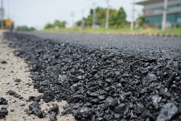 The blur of the asphalt road