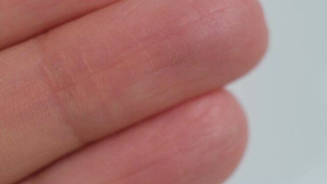 Close-up of fingerprint texture of finger skin macro. Fingerprint from close up. Body care concept