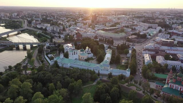 Picturesque summer view of russian town of Yaroslavl with many churches and Kotorosl river at sunset