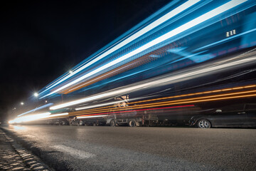 Cool long exposure cars traffic light trails, night view of the city of Rome, Italy. Wide-angle...