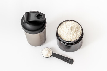 Sport bottle with protein shake and whey protein powder. Sport food supplement