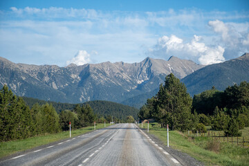 Naklejka premium View of a mountain road on a sunny day in Les Angles, France.