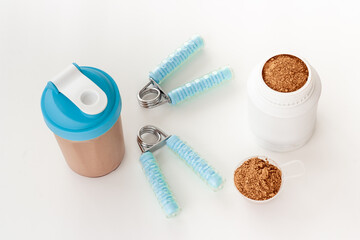 Sport shaker bottle and jar with powder whey protein. Fitness concept